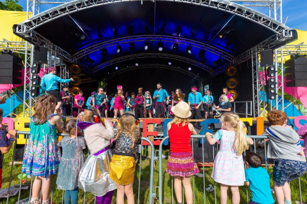 carnival collective performers on Dragonfly stage at Elderflower Fields